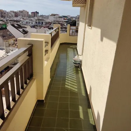 En El Centro Y Al Lado De La Playa *